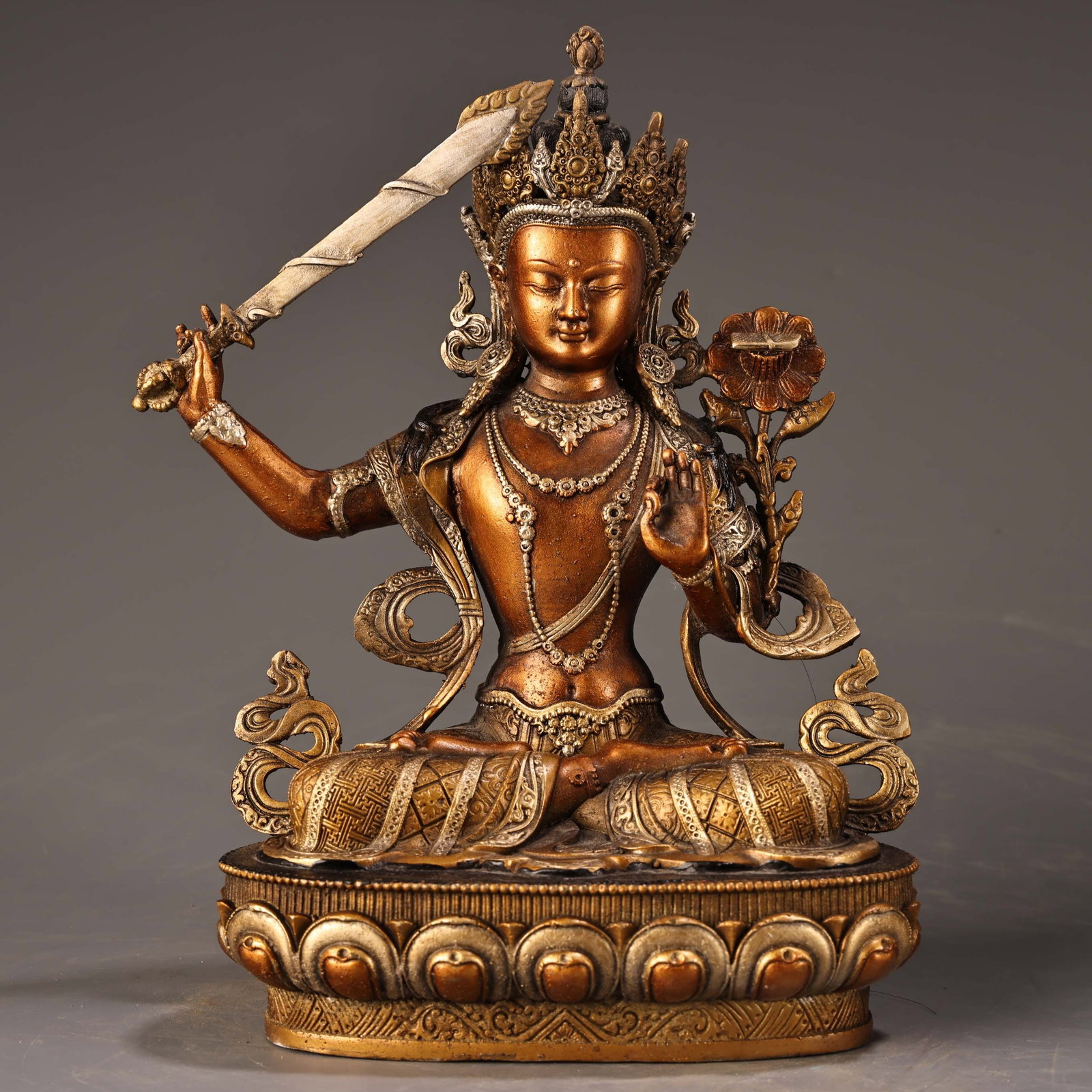 A Tibetan-style Manjushri Bodhisattva statue, crafted entirely from pure copper with high-relief (1 of 9)