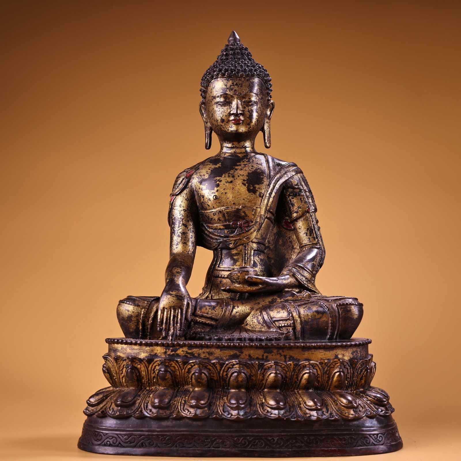 A rare, high-relief, gilded bronze Shakyamuni Buddha statue from a private collection. (1 of 9)