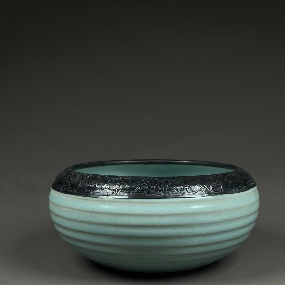 Formerly in the collection of a Song Dynasty Ru ware celadon-glazed washer inlaid with silver (1 of 9)