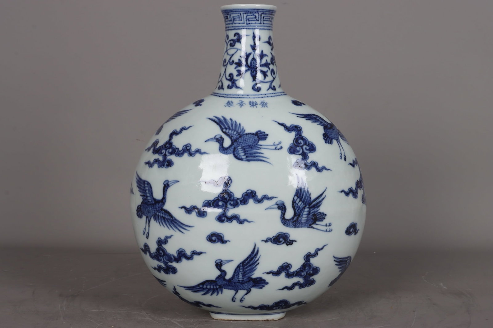 A Ming Dynasty Yongle period blue and white porcelain moon flask with crane and lotus design. (1 of 8)