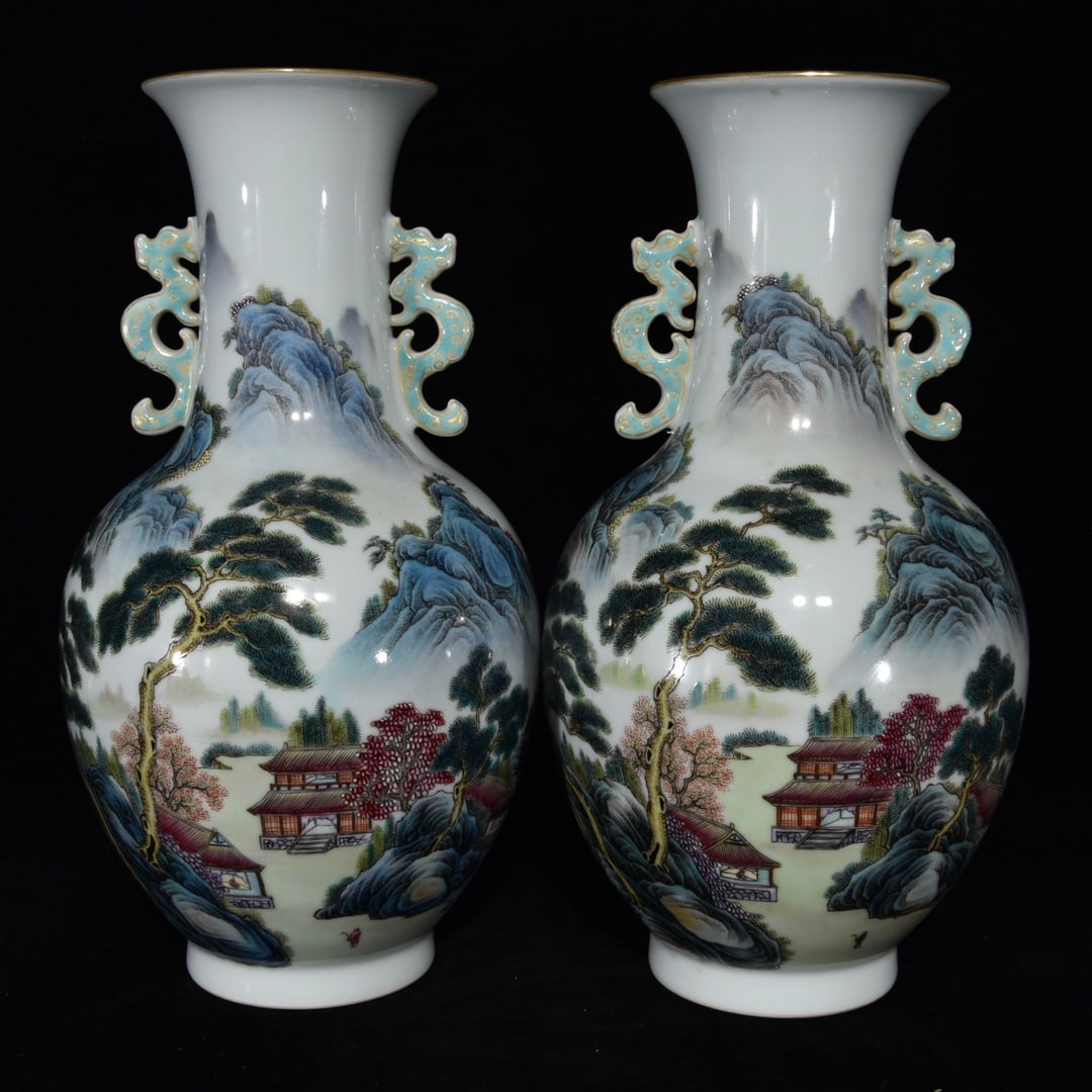 A Qianlong period famille rose vase with landscape design and two handles. (1 of 9)