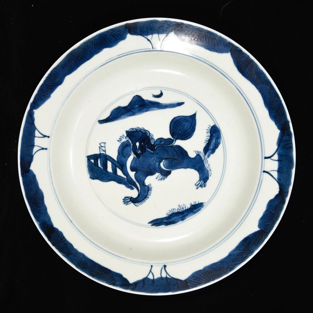 Qing Dynasty Blue and White Qilin Pattern Plate: A Qing Dynasty blue and white porcelain plate with a qilin design, 3.5 x 26 cm Provenance:Mrs. Blair, Newport Beach, California. Our dedicated team expertly handles both domestic and global shipping a