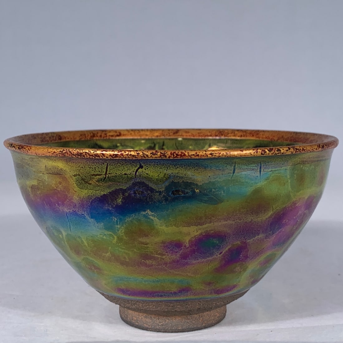 Song Dynasty Jian Kiln Yao Bian Seven-Color Tenmoku Bowl: A Song Dynasty Jian ware iridescent polychrome temmoku tea bowl, 7 cm high and 12.5 cm in diameter. Provenance:Mrs. Amily, Washington, DC. Our dedicated team expertly handles both domestic and global