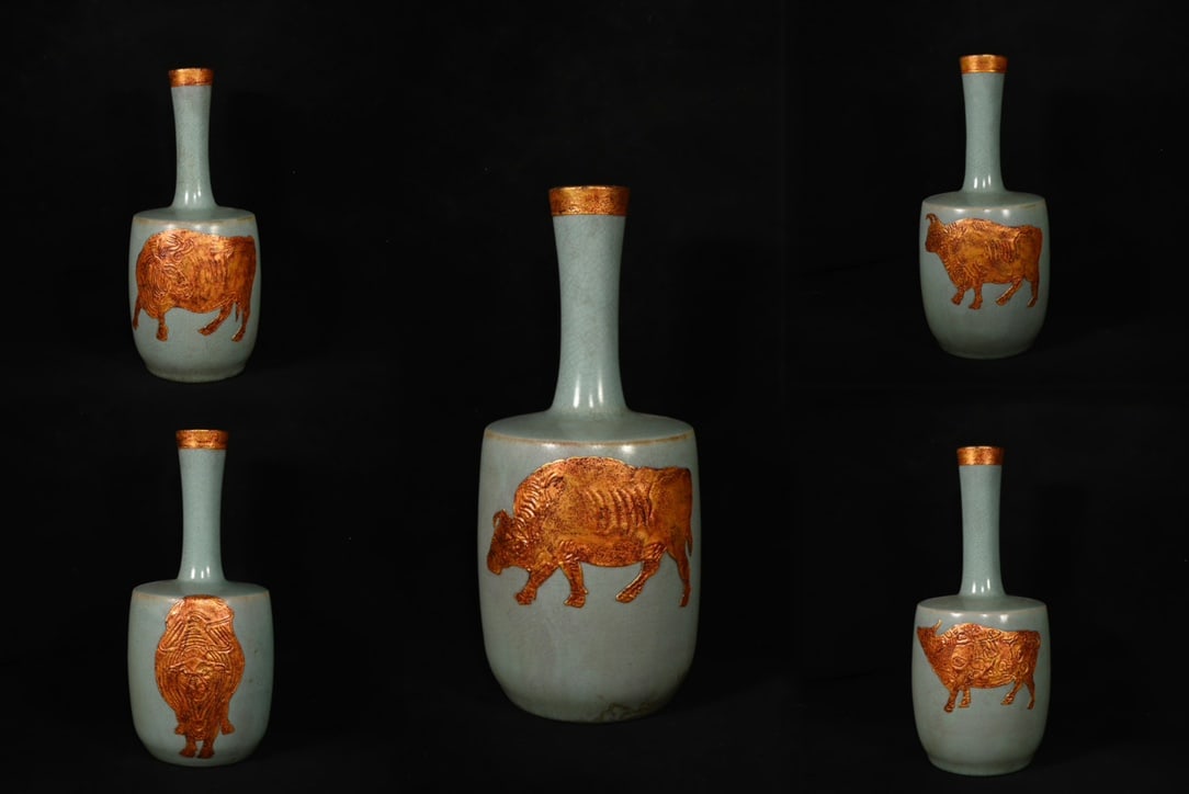 A set of five oxen, made by the Imperial Court at Qinglong Temple, from the Ru kiln of the Song: A set of five oxen, including a Ru ware vase with gold-embroidered paper decoration and the inscription "Imperial Made at Qinglong Temple" from the Song Dynasty, bearing the Palace Museum number and g
