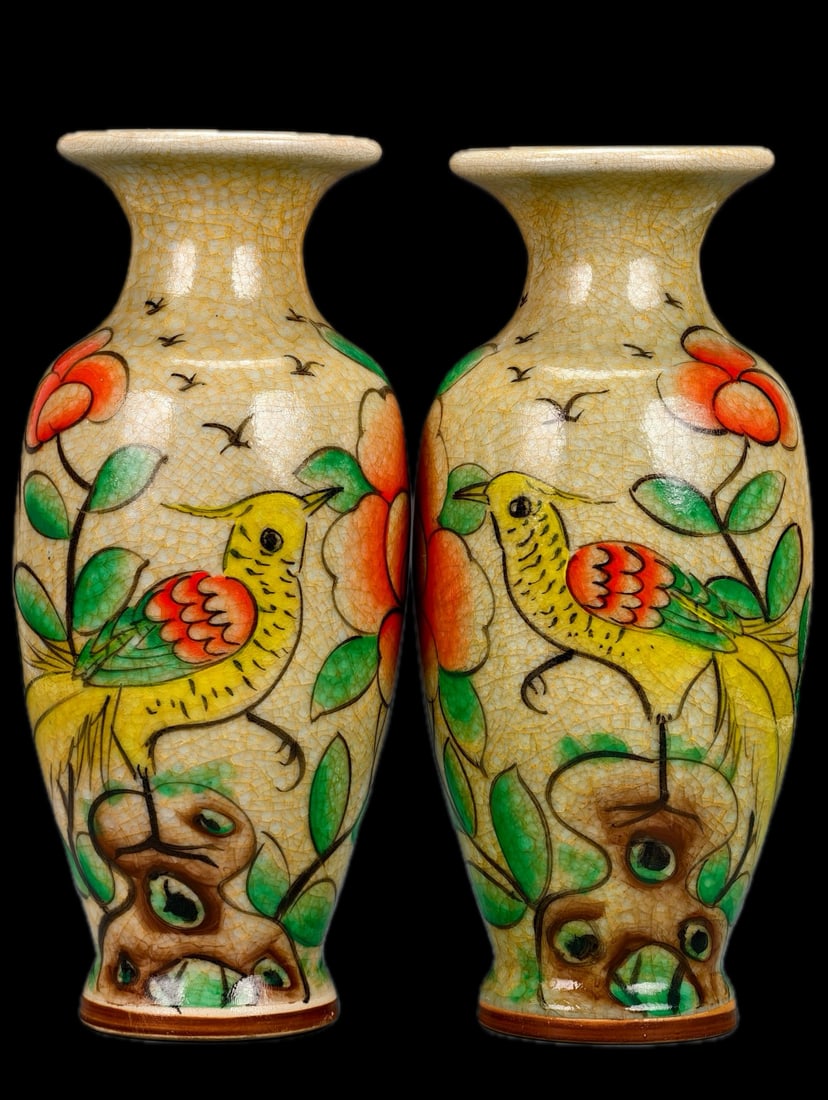 A pair of vases with a creamy yellow glaze, crackled glaze, and painted floral and bird designs, (1 of 9)