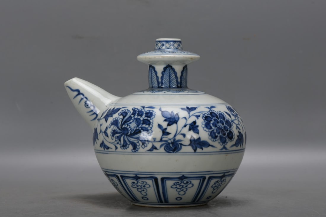 A Yuan Dynasty blue and white porcelain Jun pot with lotus scroll design (1 of 9)