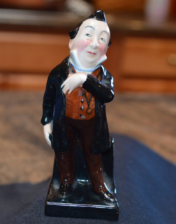 Royal Doulton Dickens - Pecksniff Figurine: Royal Doulton Figurine Pecksniff- measuring 4 1/2" tall, good condition, Shipping with Priority Mail for $8