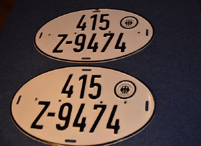Pair Matching West Germany Vehicle Plates: Pair Vintage circa 1960's era Hauptzollamt Hannoer Vehicle License Plates, about 8 1/2" by 14" oval. Nice condition for being used, nice to have a matching pair. Shipping with Priority Mail for $10.