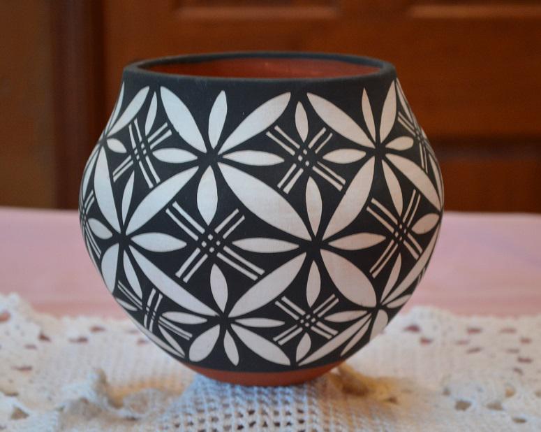 Signed 7" Antonio Coil turned handmade Acoma Pottery: By Master Potter Antonio of the Acomo Pueblo, here is a wonderful example of his works- at about 7" high and 5" across in wonderful condition. No issues noted. Shipping using Priority Mail with Tracki