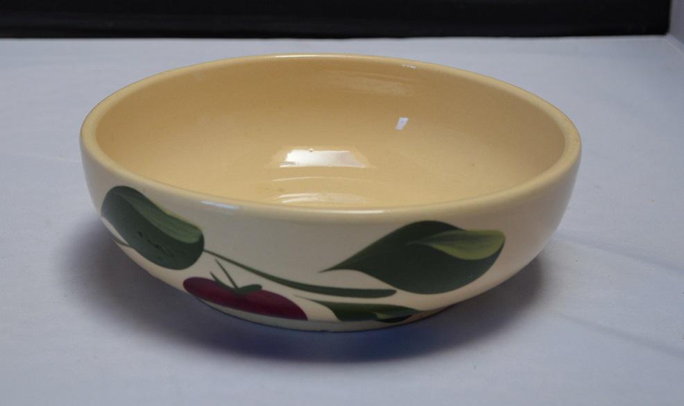 Watt Apple with Advertising # 96 Low Bowl: Highly collectible Watt Apple Bowl, measuring about 8 5/8" across and about 2 3/4" high, advertising for the Farmers Stat Bank of Minnewaukan North Dakota. Used, but a great piece to add to your Watt