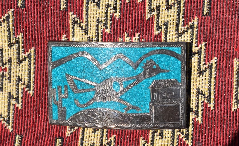 Jalisco Mexico Sterling Inlaid Roadrunner Belt Buckle: Marked Jalisco Mexico and Sterling, this 3 1/4" by 2" turquoise inlaid belt buckle has a scene of a Roadrunner , all turquoise inlay intact, could use a polishing, very nice. Domestic Shipping is $12