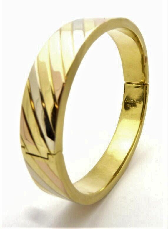 Adriano Chimento GOLD Vintage 3 Color Bangle Bracelet. 750 18k Solid Gold: Adriano Chimento GOLD Vintage 3 Color Bangle Bracelet. 750 18k Solid Gold18k SOLID Tree Tone GOLD (750)BRACELET SIZE: 7-1/2" InchesGOLD WEIGHT: 37 Gram /23.8 Dwtin excellent condition