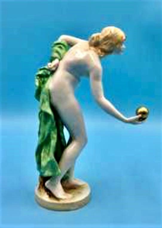 Scheibe Alsbach Kister "Ball Player" Porcelain figurine by Walter Schott (German, 1861-1938): "Ball Player"Porcelain figurine designed by sculptor Walter Schott (German, 1861-1938) in 1897. Manyfactured by Scheibe Alsbach Kister in first half of 20th century. Measures 8"H x 5"L x 3"W. Marked o
