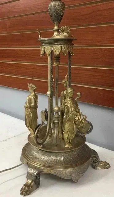 Antique large Bronze Lamp marked with Makers Stamp: Antique large Bronze Lamp marked with Makers Stamp , please see pictures . Measures 24"tall x 14" wide . Very heavy . We not sure it was a lamp originally , recently electrified .