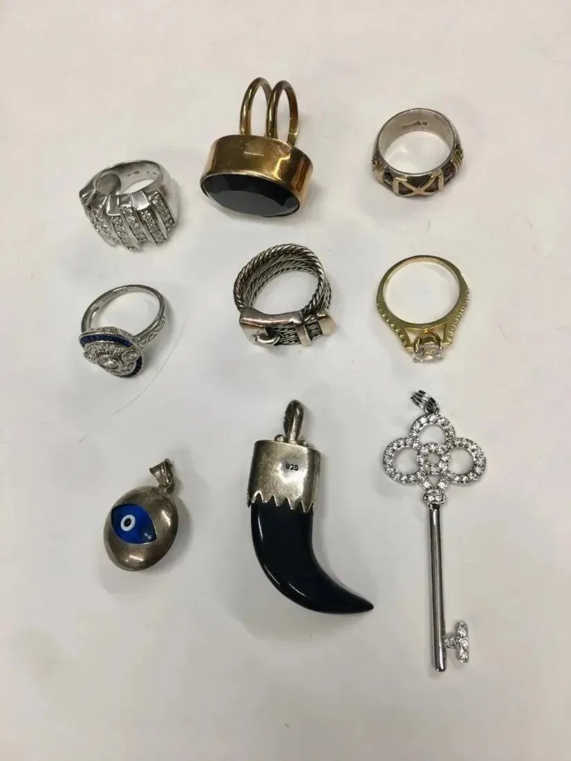 Lot of 9 Sterling Silver 6 Rings 3 charms ,total weight 70.3 gram: Lot of 9 Sterling Silver 6 Rings 3 charms ,total weight 70.3 gram.excellent condition.