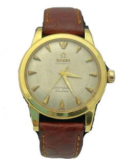 Vintage Rare Omega Seamaster De Luxe 1950-1960 Watch in 18KT: Rare Limited Release Omega Seamaster 'De Luxe' 18KT Yellow Gold.Large size 34mm case.Very fine quality heavy weight, screw-back 18KT Yellow Gold case. Genuine Italian Leather strap with gold plated bu
