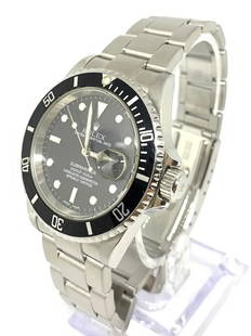 Rolex Submariner 16610 40mm Black w/ Date Stainless Steel Watch: This beautiful Rolex Submariner is in very good shape. The bracelet will fit a wrist up to 9", has 12 links on it. It does not have more links, box or papers. Serial number starts with "F", year of pr