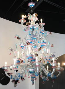 Murano Glass Unique Large Multi-Color Rezzonico Chandelier. Signed: Beautiful Hand-blown Murano Glass Chandelier with 3 levels of stunning multi-colored blown glass flowers and leaves. Signed. Measurements approx. dia50"X72"height