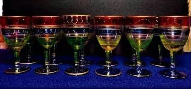 Murano 12 large shot glasses nice addition to any bar collection 4" tall: Murano hand painted 12 large 50 gr. shot glasses. Nice addition to any bar collection. Measures 4"tall x 2" Wide .