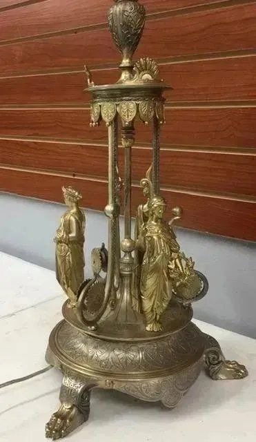 Antique large Bronze Lamp marked with Makers Stamp: Antique large Bronze Lamp marked with Makers Stamp , please see pictures . Measures 24"tall x 14" wide . Very heavy . We not sure it was a lamp originally , recently electrified .