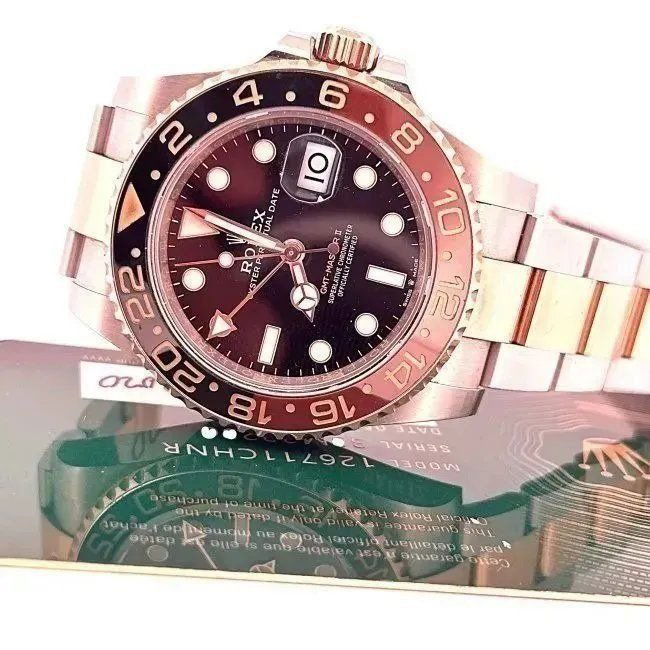Rolex GMT-Master II ROOT BEER Steel Rose Gold 126711CHNR BOX AND PAPERS 2020: 100% Authentic Rolex GMT-Master II ROOT BEER Steel Rose Gold 126711CHNR With PAPERS 2020. The Oyster Perpetual GMT-Master II in Oystersteel and Everose gold with a black dial and an Oyster bracelet.Wi