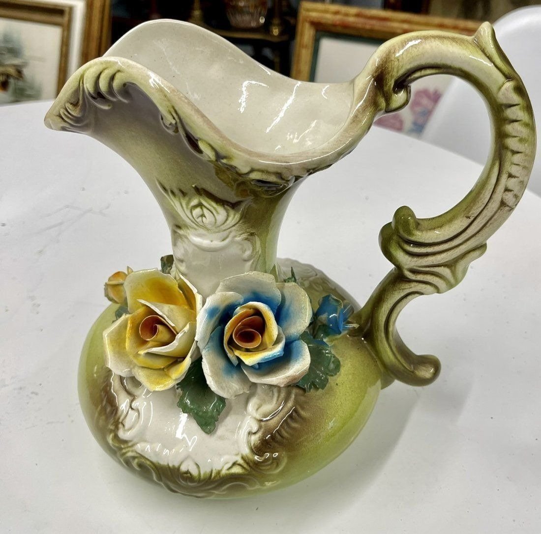 Vintage Capodimonte Pitcher Made in Italy 10 tall: Very nice Vintage Capodimonte pitcher, made in Italy, measures 10” inches high, in good condition.