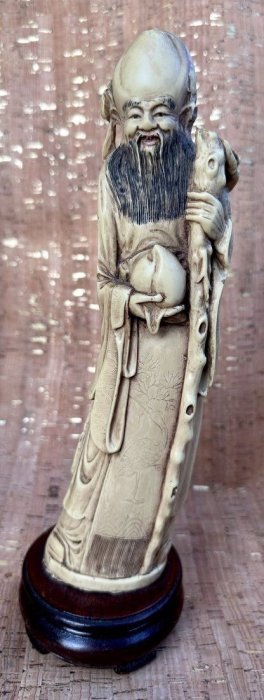 Antique Chinese Carved bone Figurine of Shoulao on Wooden Base