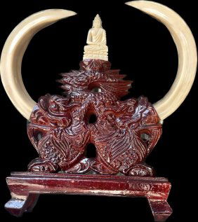 old Chinese group consisting of an elaborate carved wood base in the form of a double headed dragon