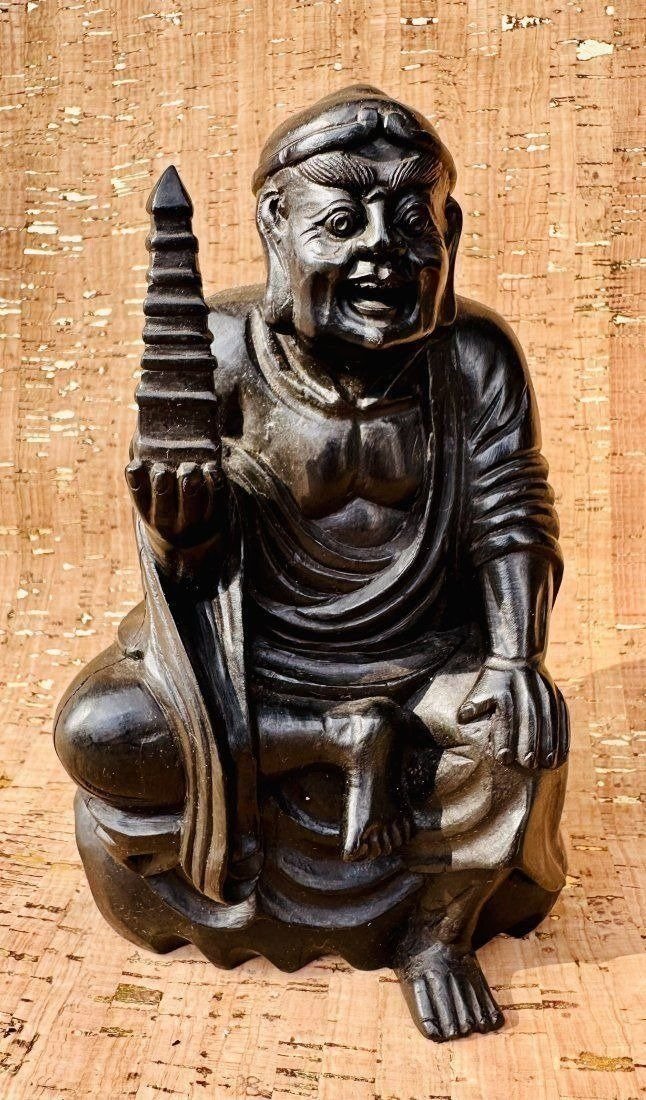 Antique Chinese Carved Agarwood Figure of Sitting Man: Antique Chinese Carved Agarwood Figure of Sitting Man. Well carved. Measures 7"inches tall . In excellent condition