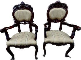Pair of French rosewood arm chairs