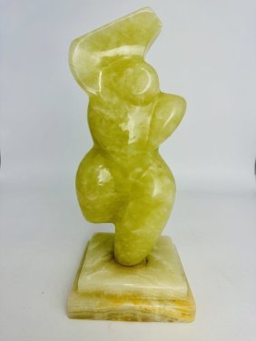 FEMALE TORSO Sculpture in translucent light green onyx Botero style