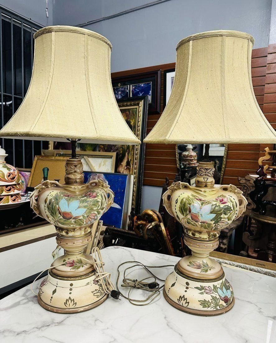 TWO LARGE ITALIAN CAPODIMONTE PORCELAIN TABLE LAMPS: Lot of two large Italian porcelain table lamps. 35” H with shade. Good condition.