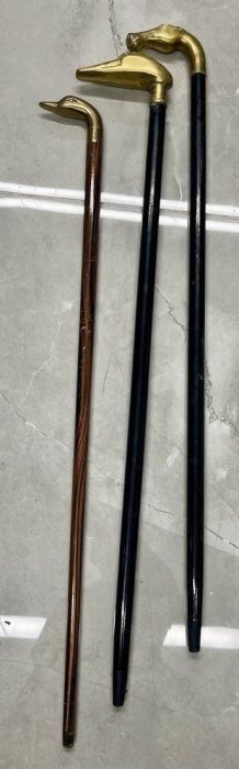 3 Walking canes /  with bronze duck-head horse-head bird-head