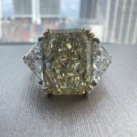 7.78 CTS PLATINUM RING WITH DIAMOND YELLOW FANCY COLOR RADIANT