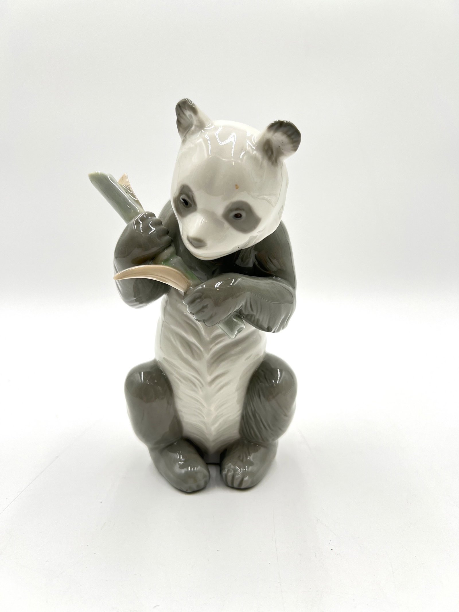 NAO Vintage 1979 Lladro Porcelain Panda eating bamboo: NAO Vintage 1979 Lladro Porcelain Panda eating bamboo. Hand Made, Gloss finish