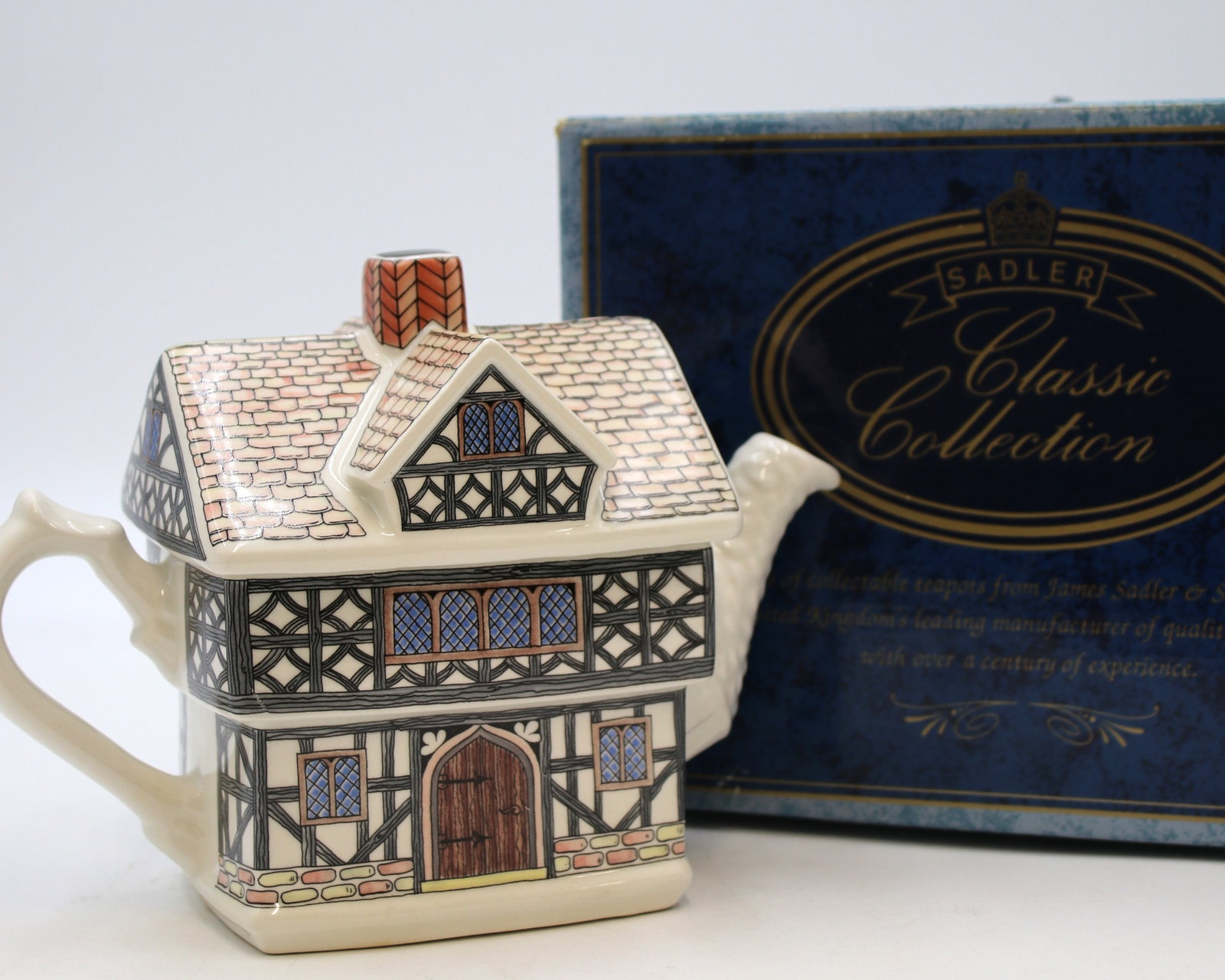 Vintage SADLER "Tudor House" English Teapot: Vintage teapot from "Has an inspection number on the bottom and a description of the design. James Sadler and Sons Ltd is a British was a pottery manufacturer founded in 1882 by James Sadler in Bursle