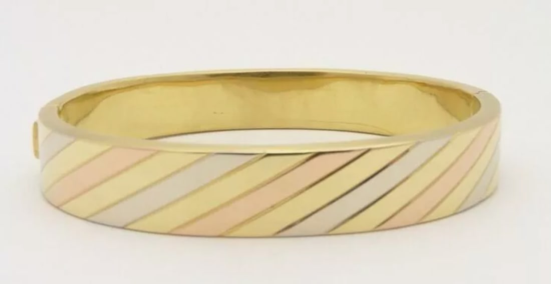 18K ADRIANO CHIMENTO VINTAGE 3 COLOR BANGLE BRACELET: Description: Vintage adriano chimento bangle bracelet the Material: 18k solid three-tone gold Bracelet size: 7.5 inches Weight: 37 grams / 23.8 dwt Condition report: pre-owned. refer to photos for