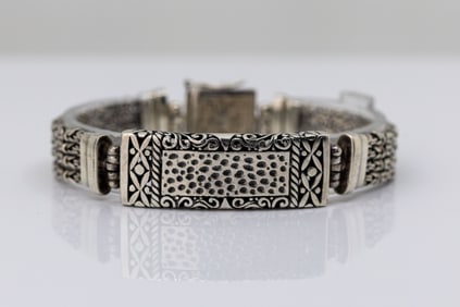 STERLING SILVER BRACELET WITH CARVINGS