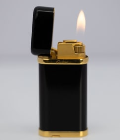 CARTIER BLACK AND GOLD LIGHTER