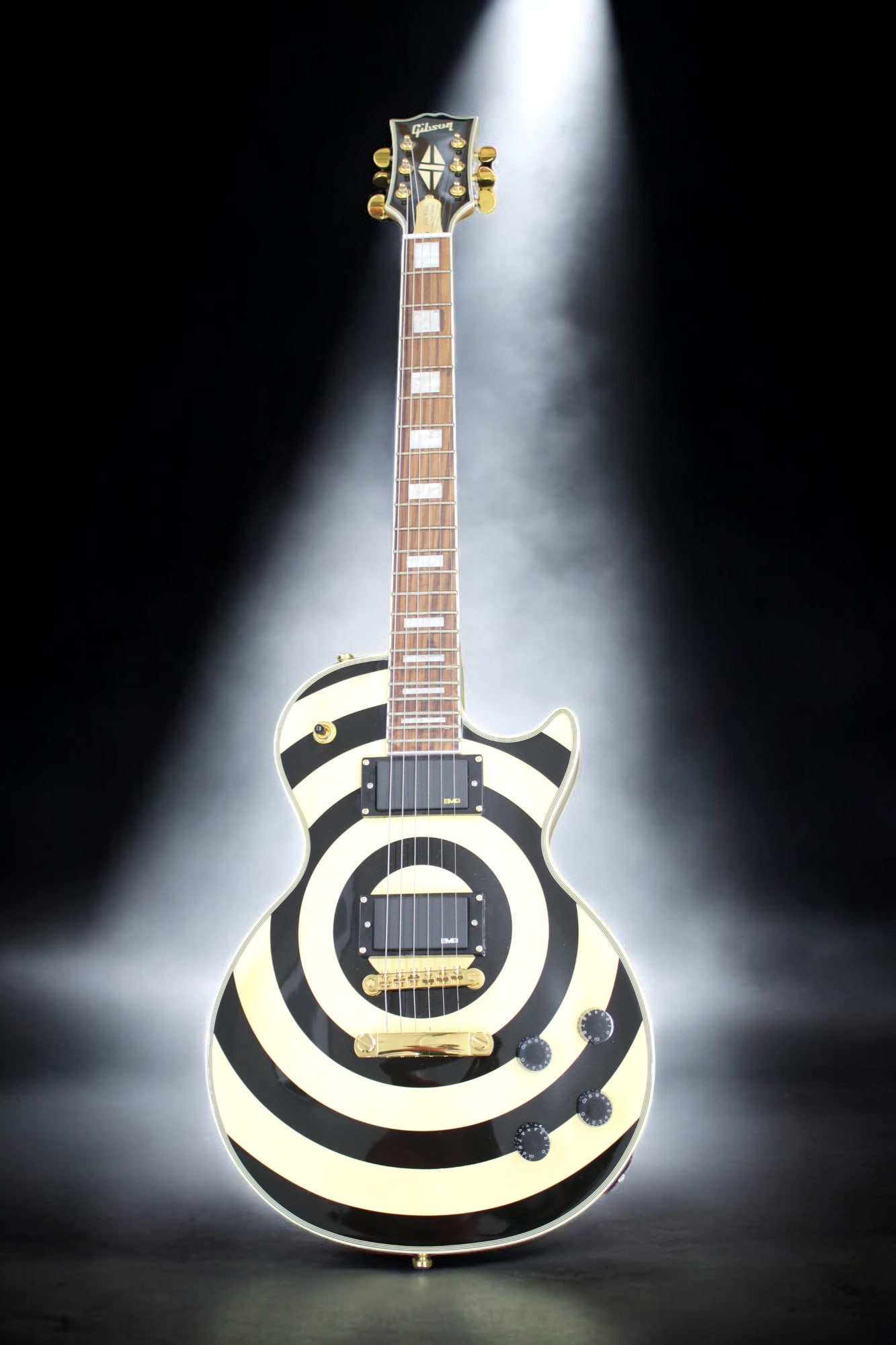 ELECTRIC GUITAR: Description: Electric Guitar in a black and white color. Measurments: 4ft Condition report: Refer to photos for more information