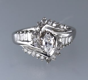 14K WHITE GOLD RING WITH 0.17CT MARQUISE CENTER STONE