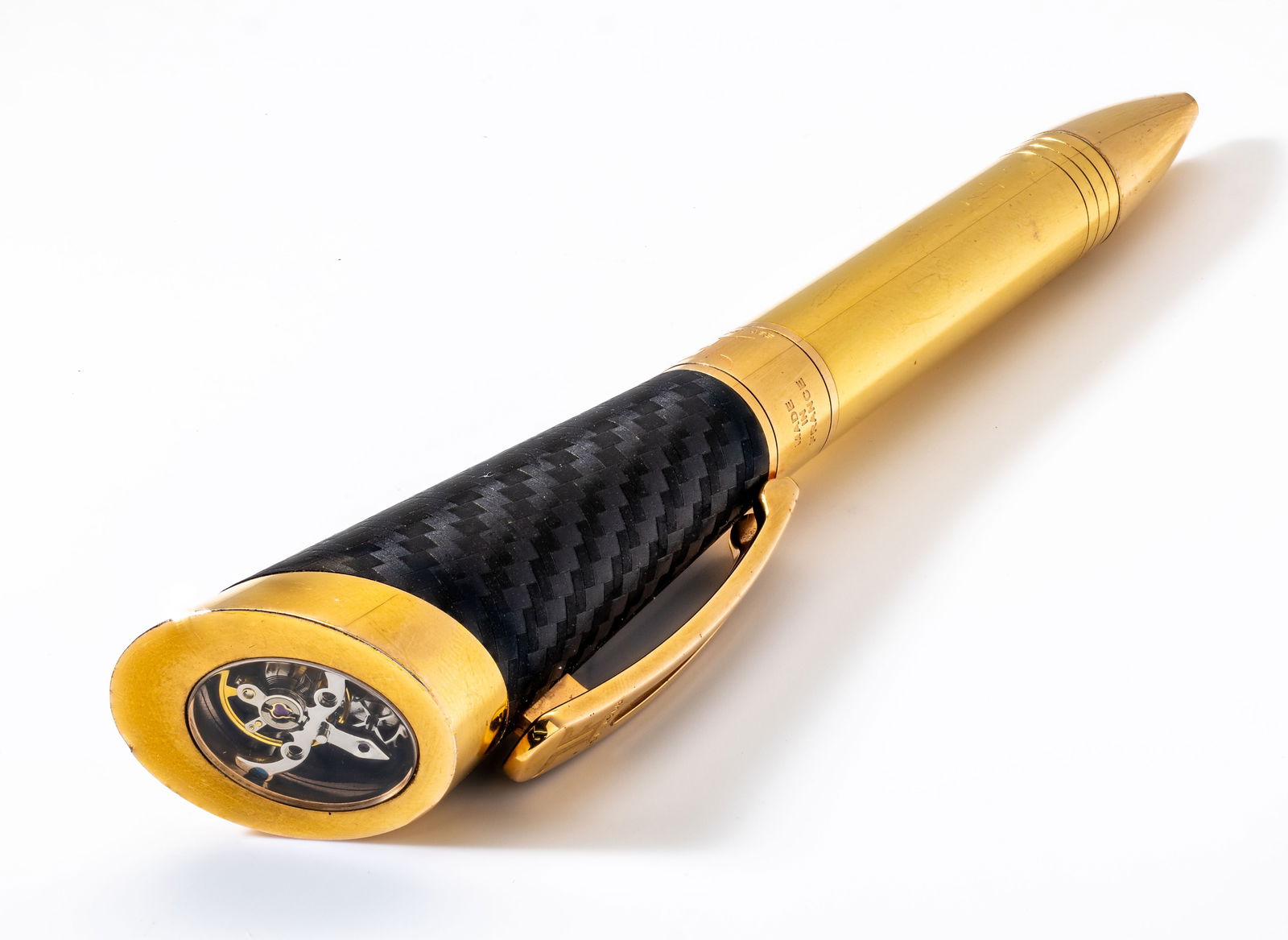 TF EST. 1968 GENEVE SWISS TOURBILLION PEN: Description:TF Est.1968 Model Tourbillon Pen Material: Yellow Gold Plated And CarbonMaterial:Gold Plated, Carbon Measurments: 148 mm Weight:73.3 g