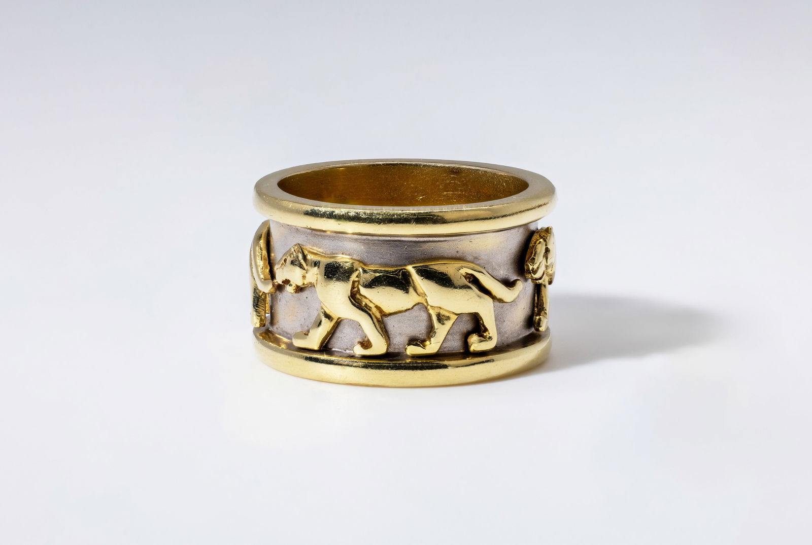 TWO TONE GOLD CARTIER STYLE PANTHER RING: Description: Two Tone 14k Gold Cartier Style Ring.Material: 14K Yellow Gold, approx. 2.20 ct Emerald with DiamondsWeight: 13.8 gSize: 7.5Co