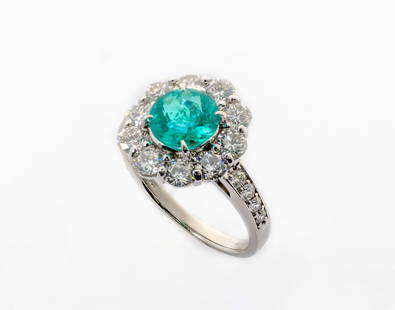 GIA 1.64 CT BRAZILIAN PARAIBA TOURMALINE PLATINUM RING. CERTIFICATE INCLUDED: Description:Beautiful Platinum Ring with Brazilian Paraiba Tourmaline center stone and with VS1-SI1 diamonds Material:Platinum Stones:Center stone: 1.64 CT Brazilian Paraiba Tourmaline Blue Green Colo