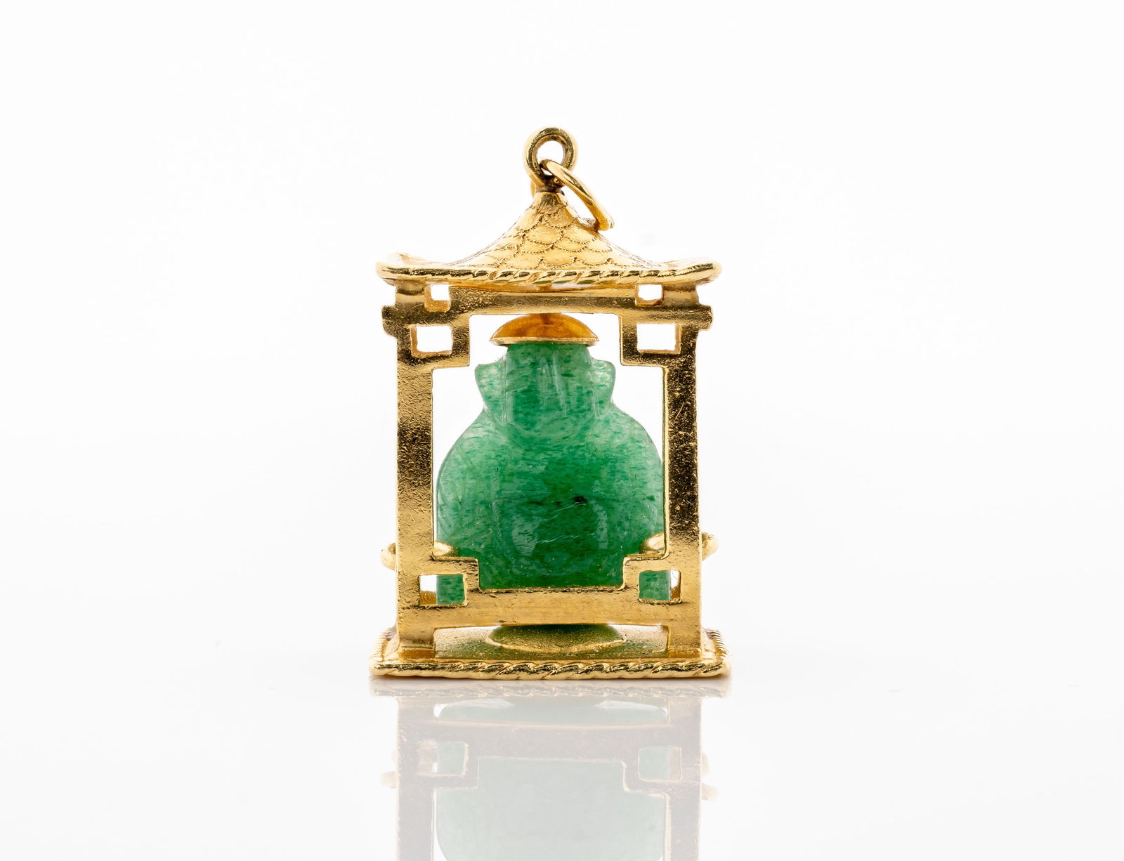 14K GOLD BUDDHA TEMPLE PENDANT WITH JADE: Title, medium: 14K Gold Buddha Temple Pendant with Jade Material: 14K Yellow Gold, Jade Dimensions: 0.9' x 0.7'in Weight: 10 gr S