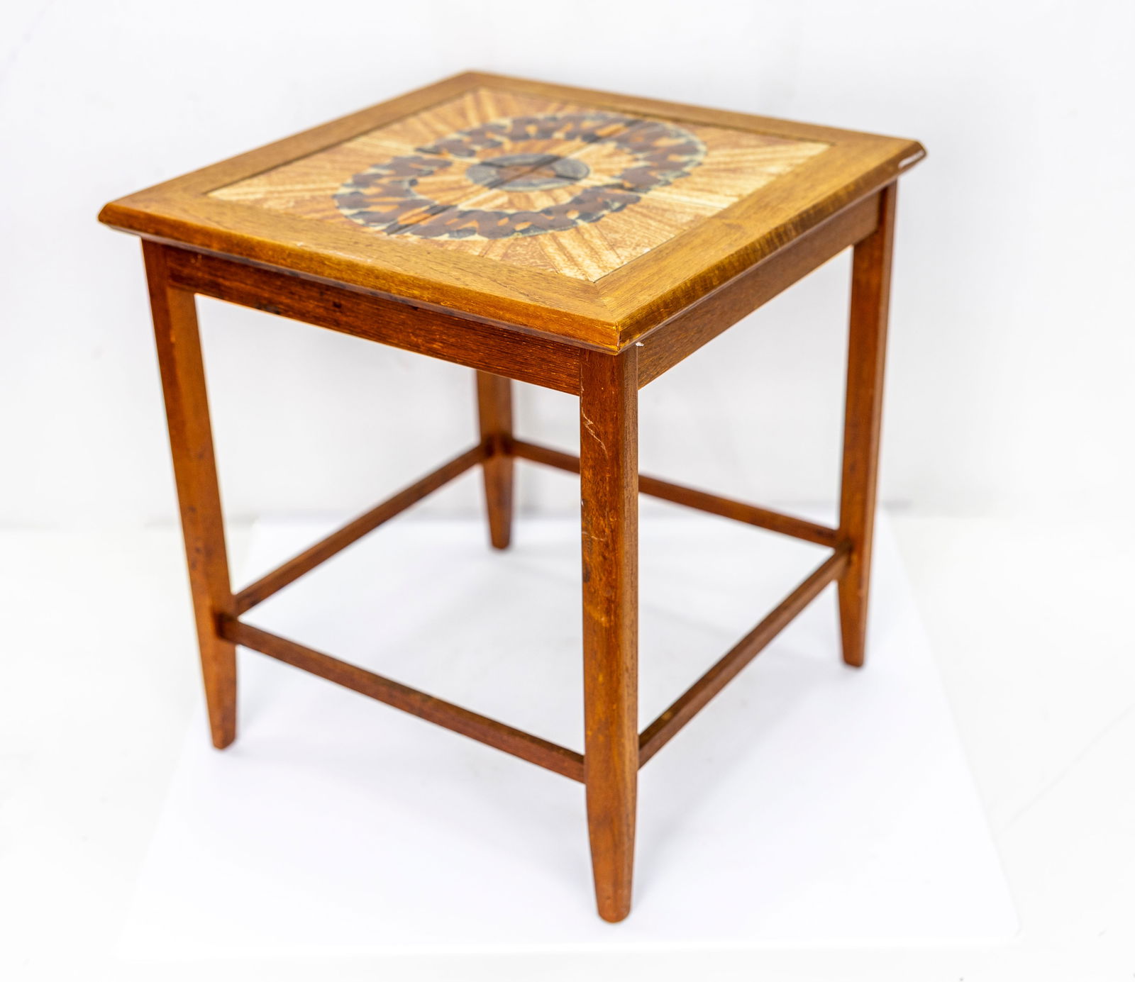 Danish Modern Mobelfabrikken Toften Tile-Top Nesting Table, Denmark, 1960s: Description: Tile-top nesting table, crafted in denmark during 1960's by Mobelfabrikken Toften, excudes a warm inviting charm. Its teak frame and legs showcases the wood's natural beauty, while the in