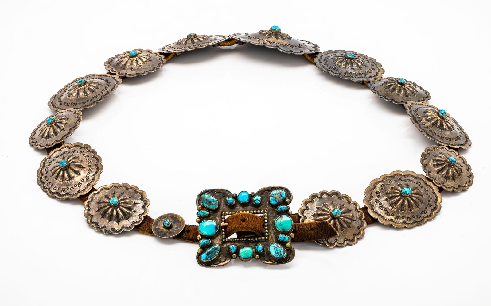 Vintage Navajo Sterling Silver & Turquoise Small Concho Belt: Title: Vintage Navajo Sterling Silver & Turquoise Concho Belt Description: Vintage navajo concho belt with hand-stamped conchos and vibrant turquoise cabochons on leather. F
