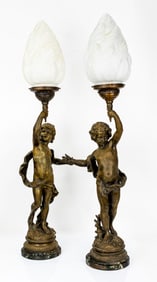 Pair of French Figural Torchere lamps with Frosted Flame Shades