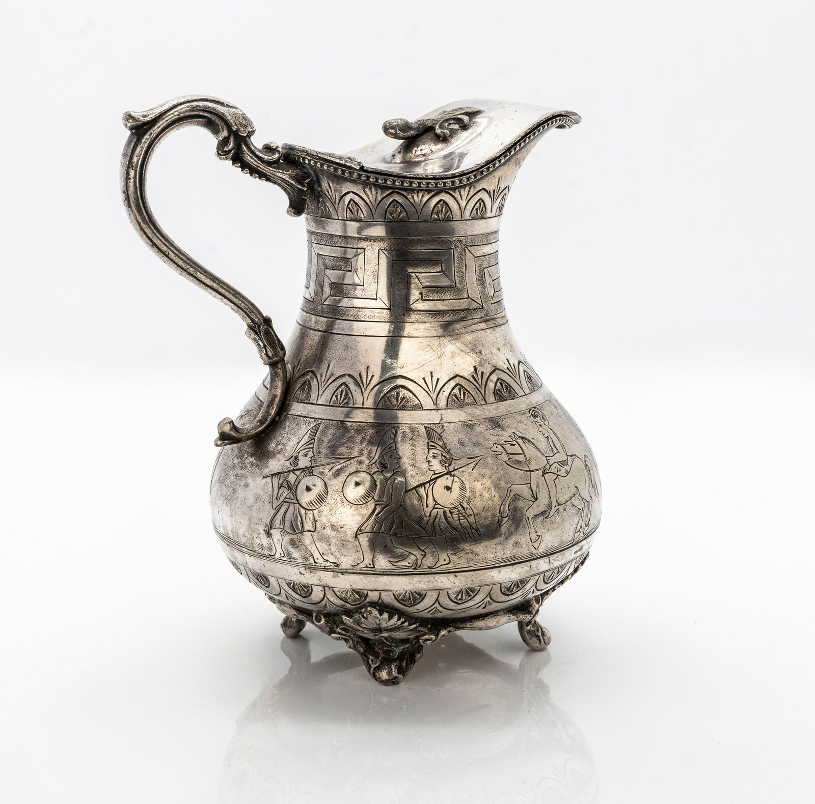 Decon & Francis French Antique Creamer with Classical Warrior Frieze: Title:Decon & Francis French Antique Creamer with Classical Warrior Frieze Description: A beautifully crafted French antique creamer or small pitcher featuring a hinged lid topped with a decorative fi
