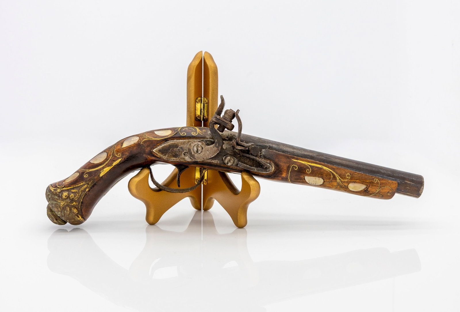 Ottoman Flintlock Pistol (20th century), Mother-of-Pearl and Brass Inlay: Title: Flintlock Pistol, Mother-of-Pearl and Brass Inlay Origin: North Africa, early 20th. Material: Mother-of-Pearl and Brass Inlay Measurements:14 in.
